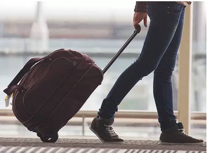 Pack Heavier Items at the Bottom of Your Suitcase
